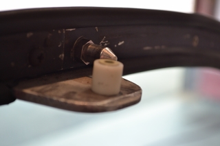 Correct canopy striker assembly