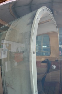 White gasket at front of turtledeck seen through canopy side glass